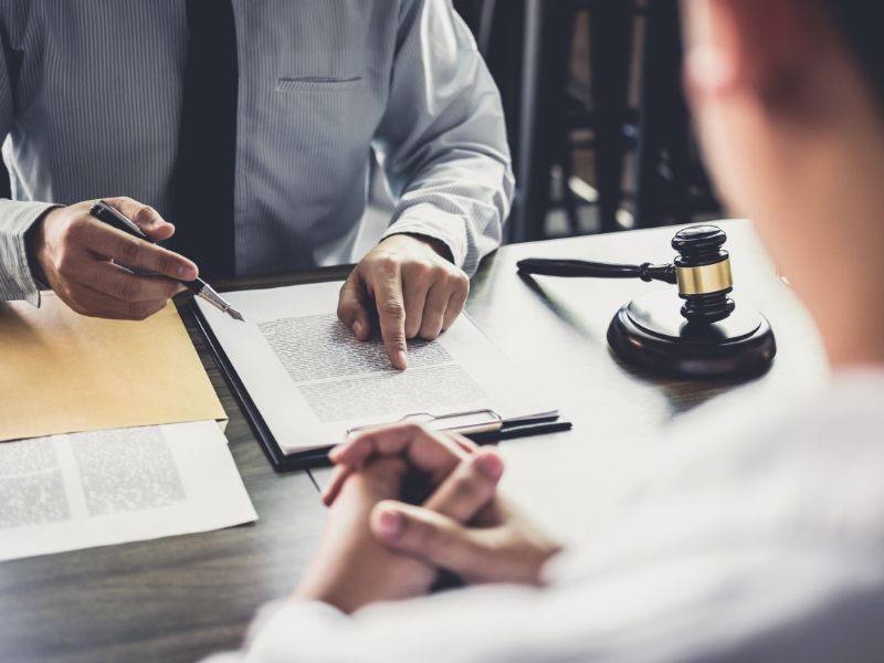 businessman-and-male-lawyer-or-judge-consult-having-team-meeting-with-client-law-and-legal-services-concept